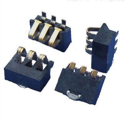 Kolikkokennojen koskettimet ja akkupidikkeet